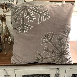 Silver embroidered snowflake winter throw pillow